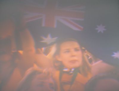 A canarian lady seems interested in watching us. Rugby: Go Patrick, go Australia ! (Santa Cruz de Tenerife, Spain)
