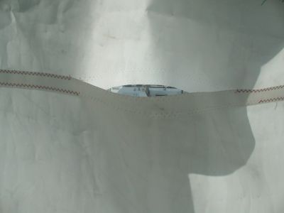 Main sail repared by our own poor fingers. Can't find a red thread any more, multi-threads are not 