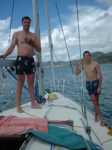 Jules and Henri-Charles are chilling while le FoLaLieR is moving with the engine, since the trade Winds vanished today (Le Diamant, Martinique)